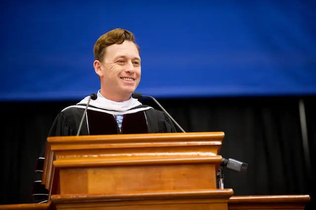 Silas House addresses the graduates.