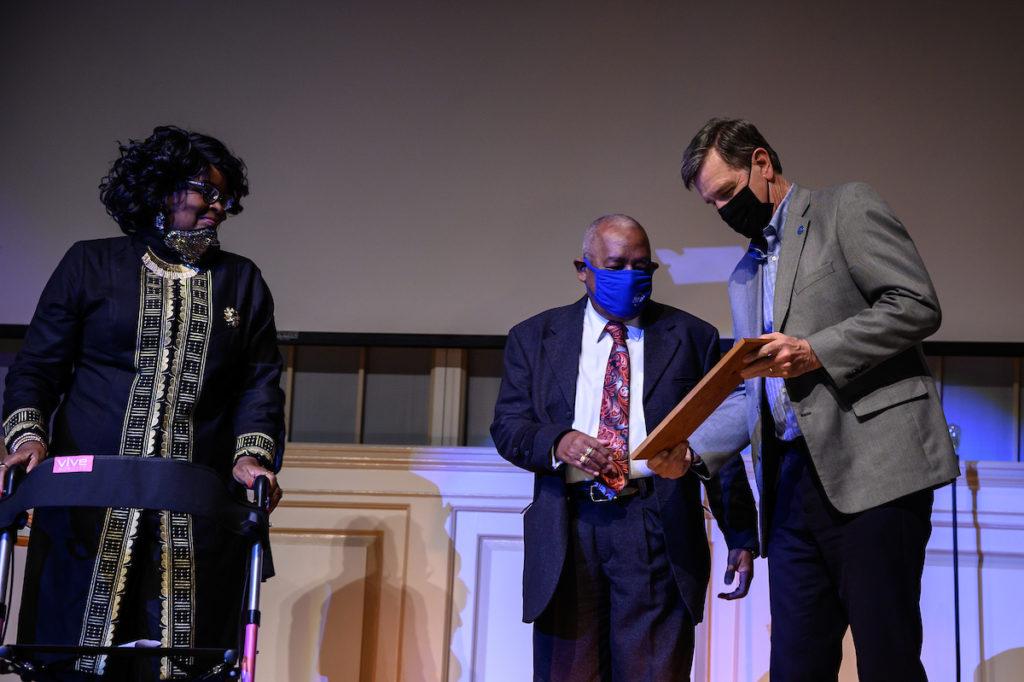 Baskins accepting alumni awards at Homecoming