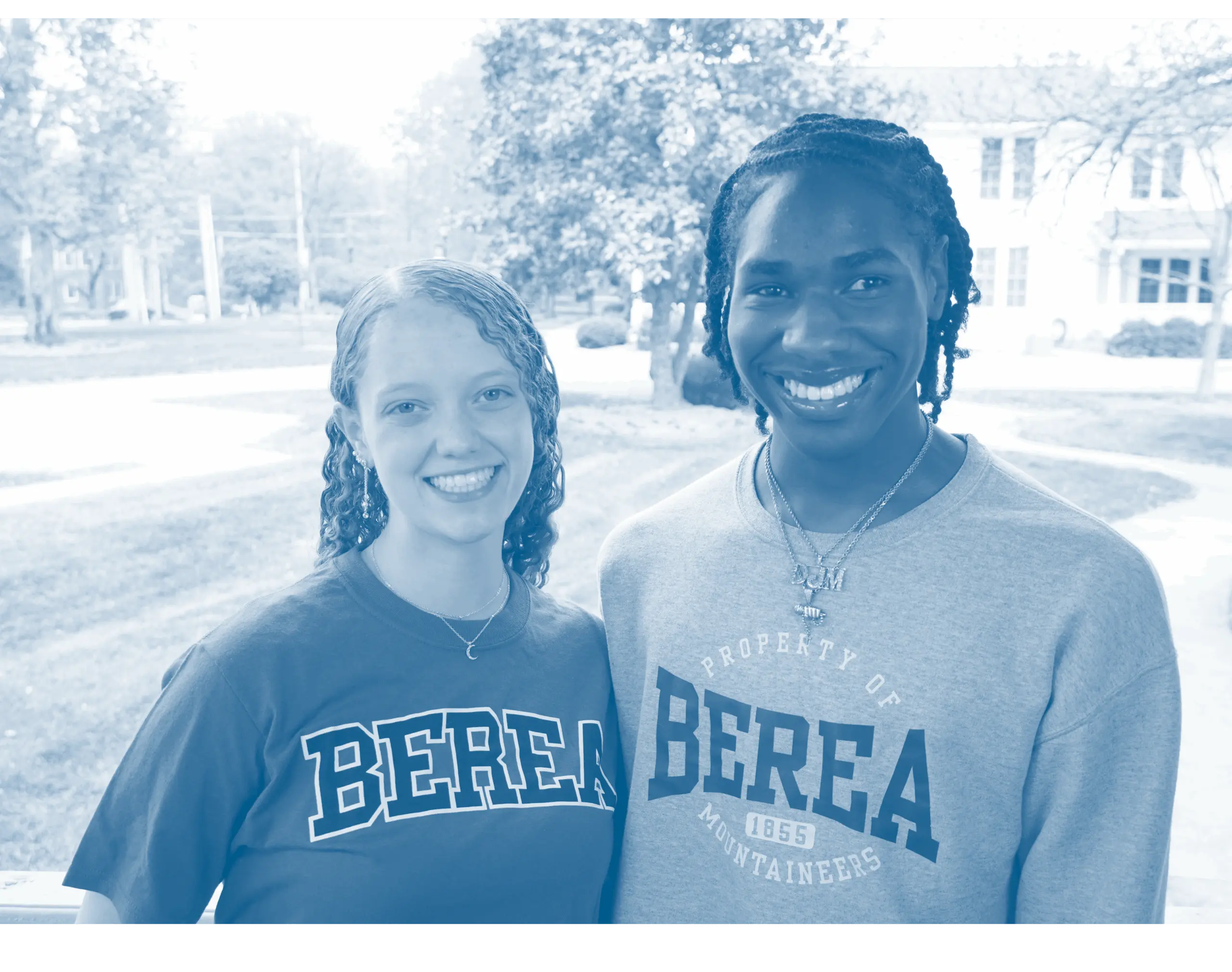 A blue-filtered photo of two students wearing shirts that say 'Berea.'