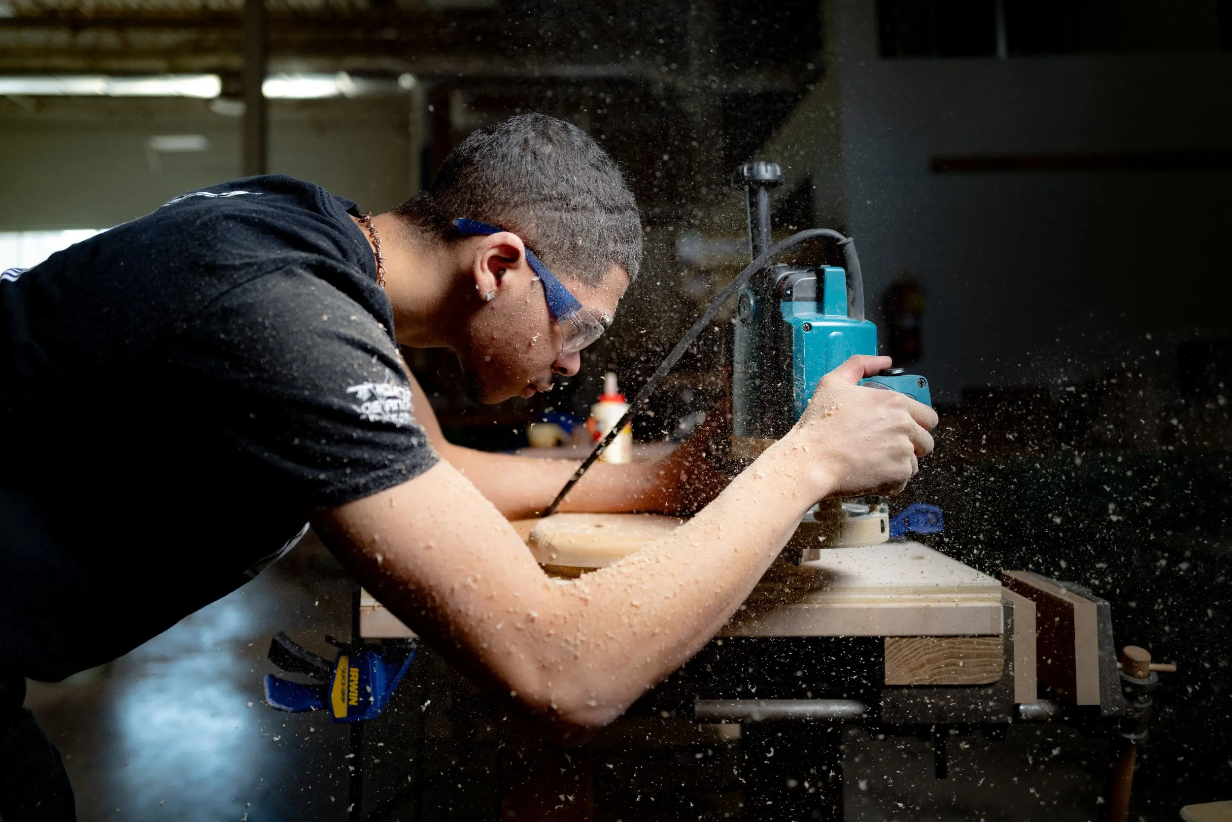 Student working in the campus woodworking shop
